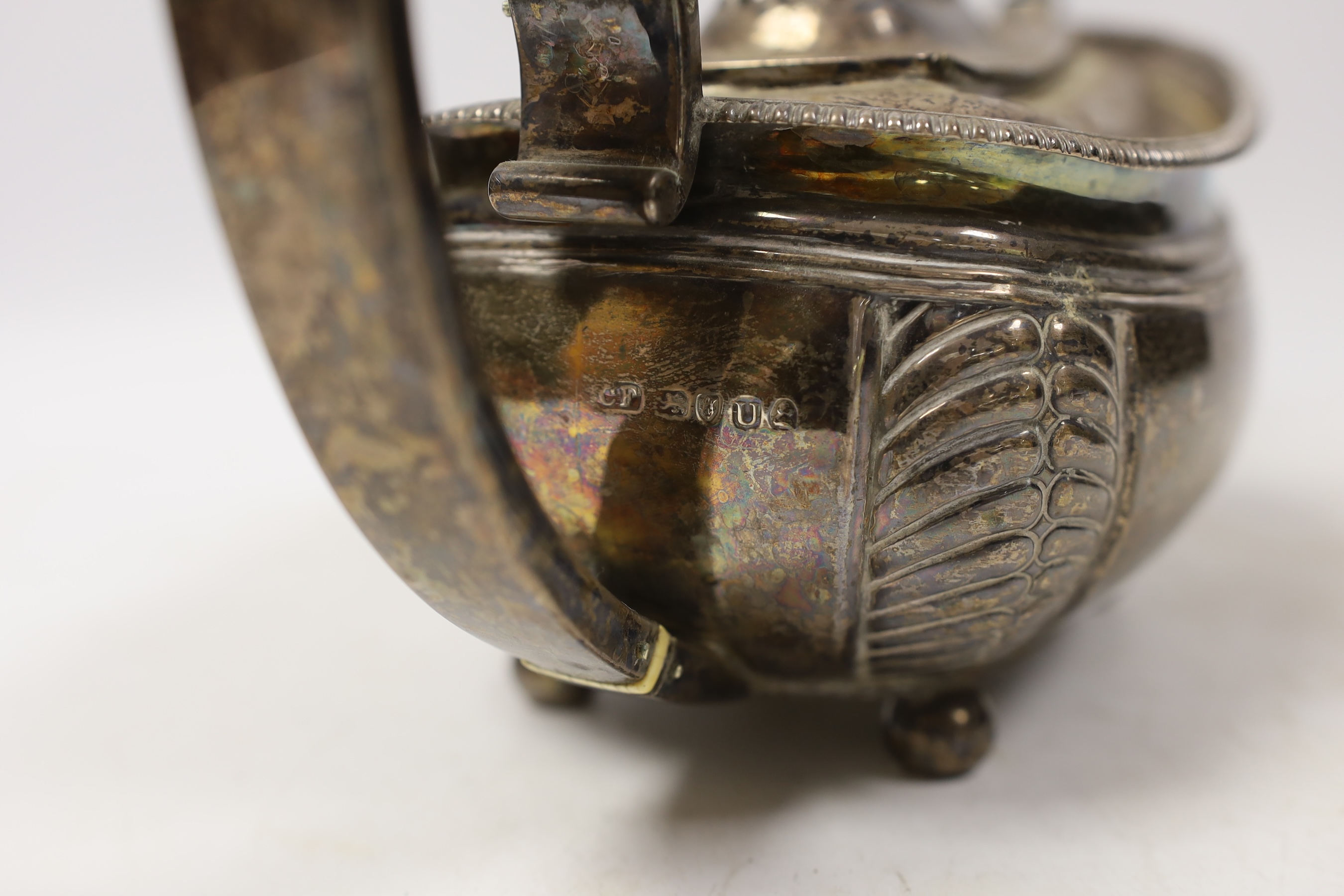A George III silver shaped oval teapot, Charles Fox, London, 1815, with ivory CITES submission reference 9QAQRA42, gross weight 19.9oz.